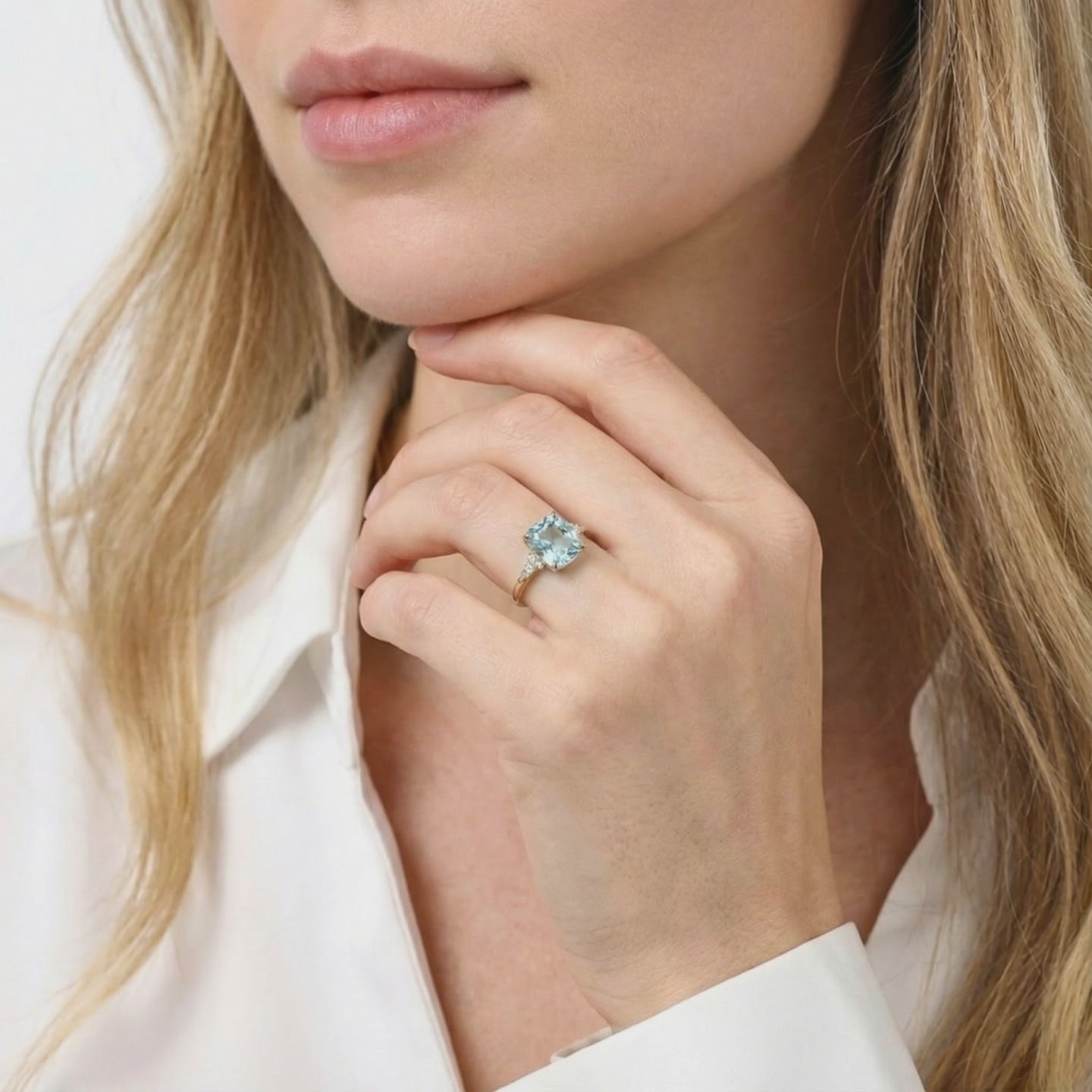 Solid gold ring with simulated aquamarine stone.
