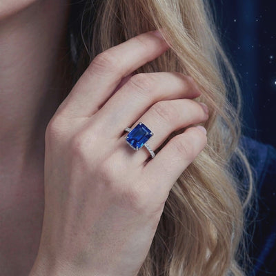 Radiant cut simulated sapphire ring in solid gold.