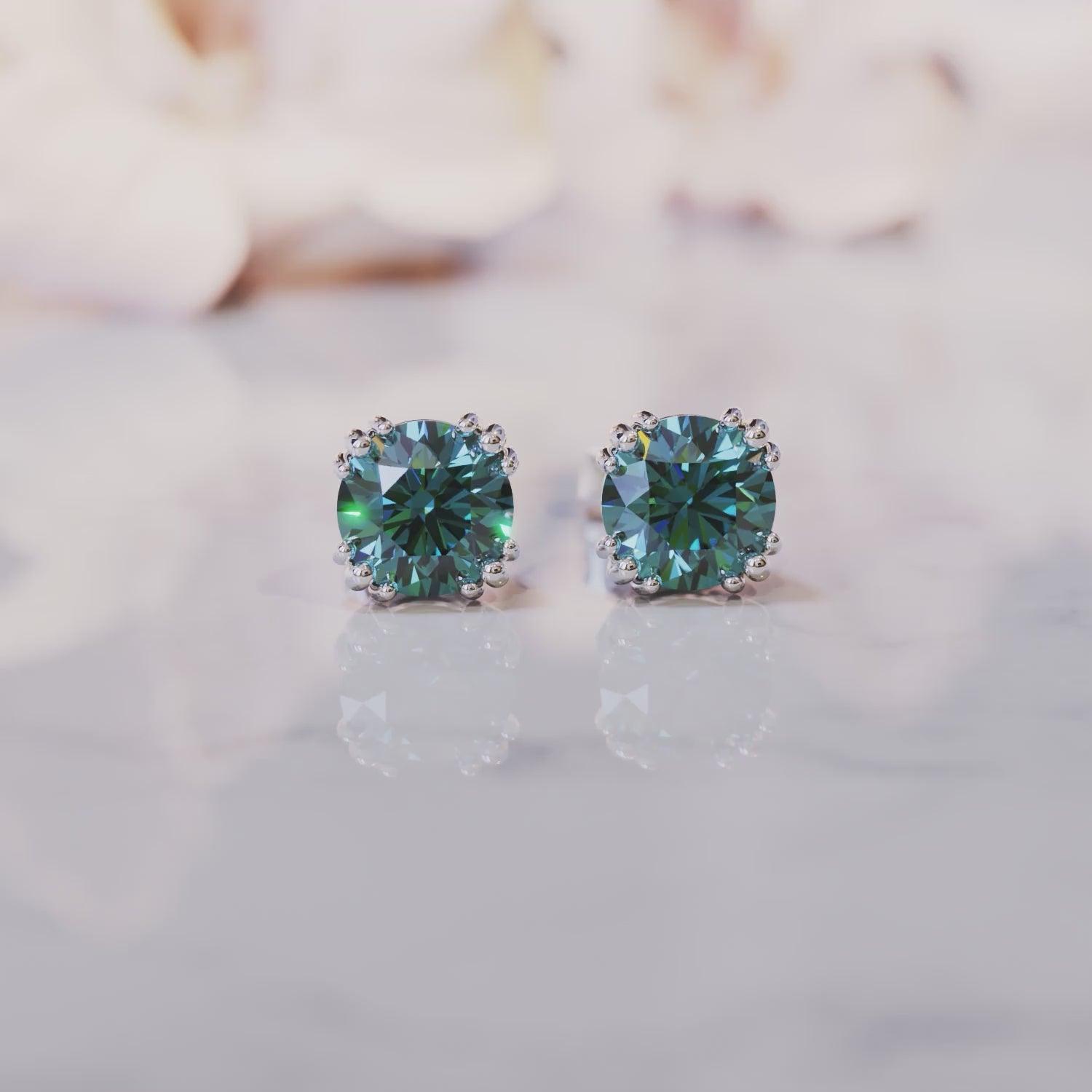 Video showcasing the Daphne Lab-Grown Alexandrite solid gold earrings.