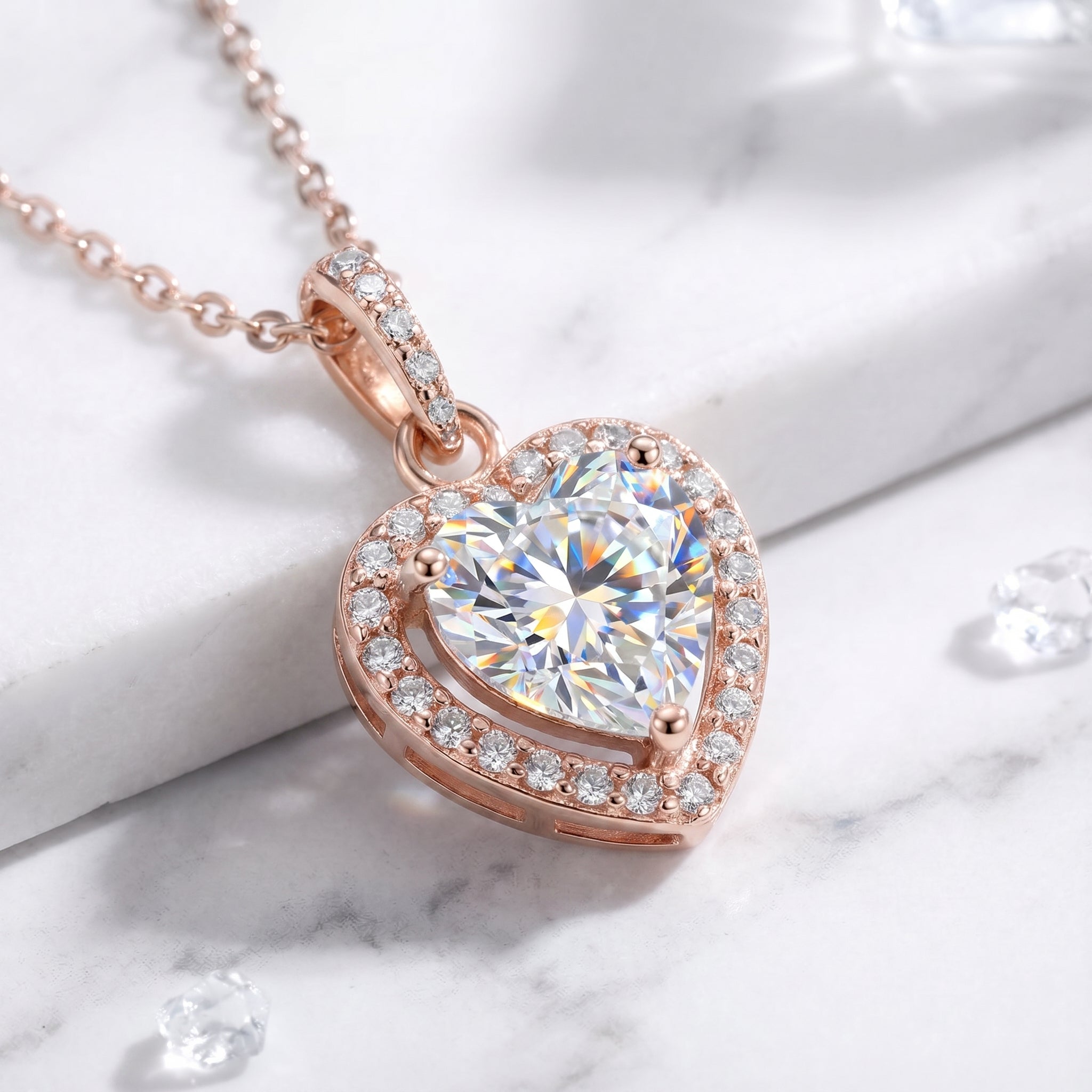 Heart-cut simulated diamond necklace in solid rose gold.