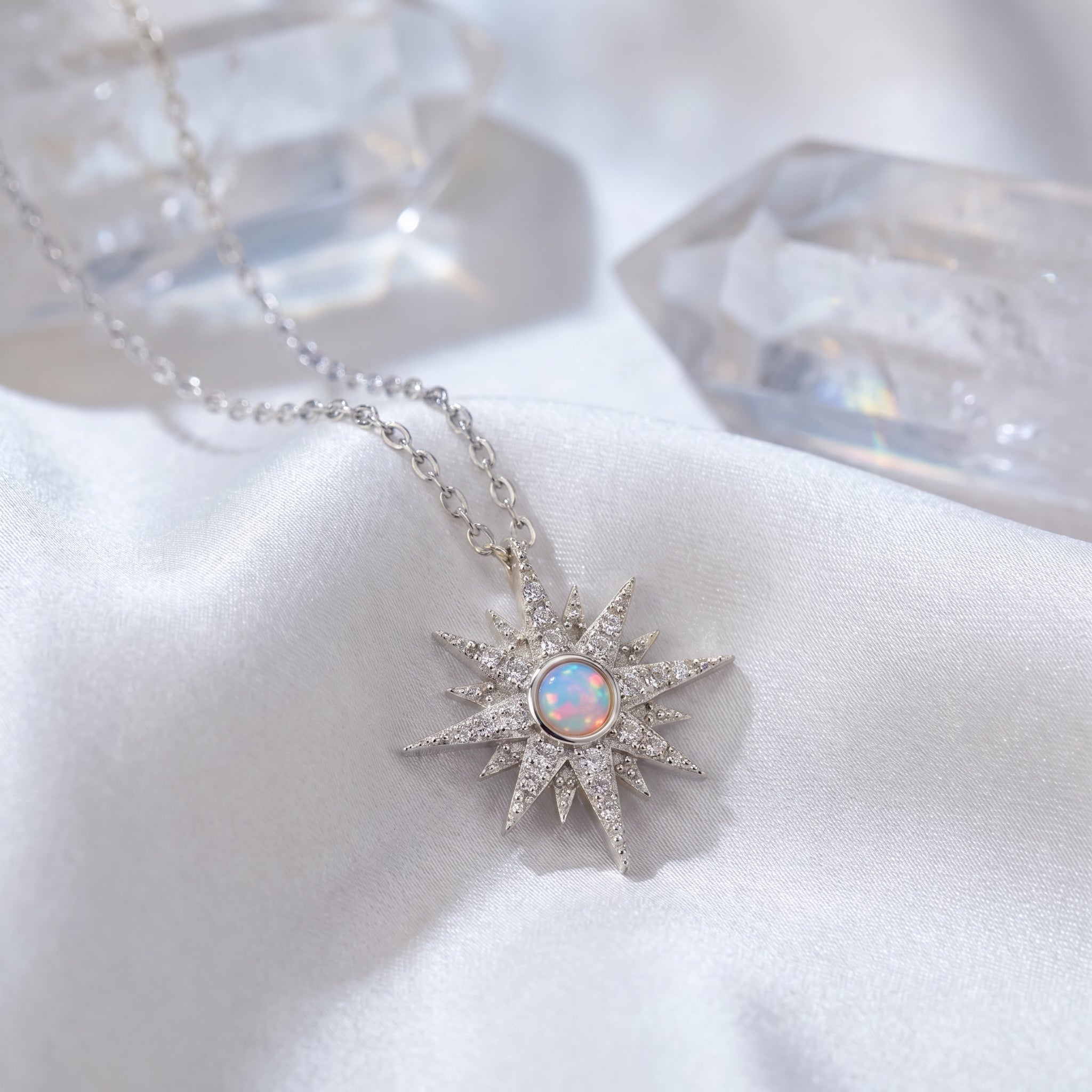 Solid gold Astralia necklace featuring a natural white opal.