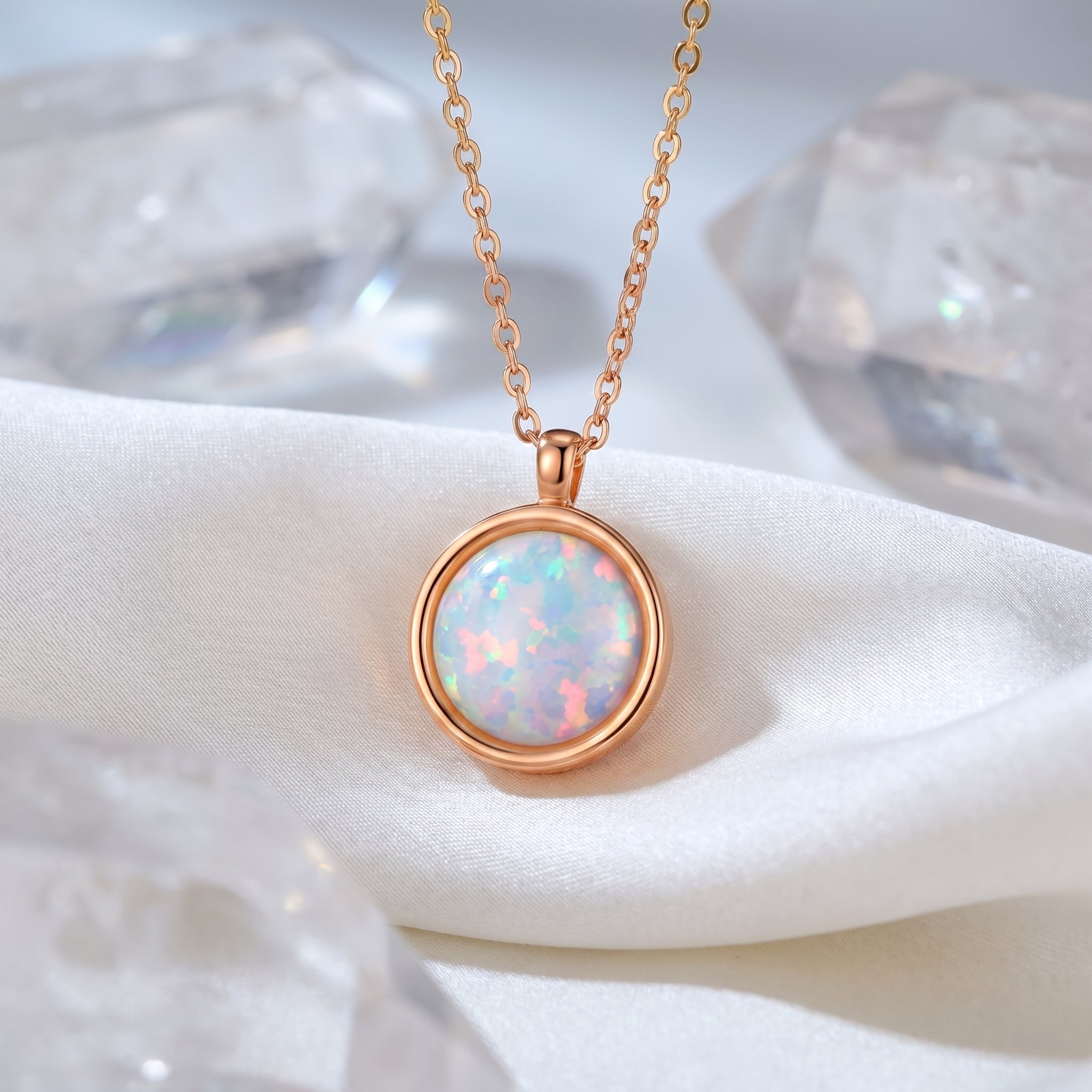 The Fiora Halo natural opal necklace in rose gold.