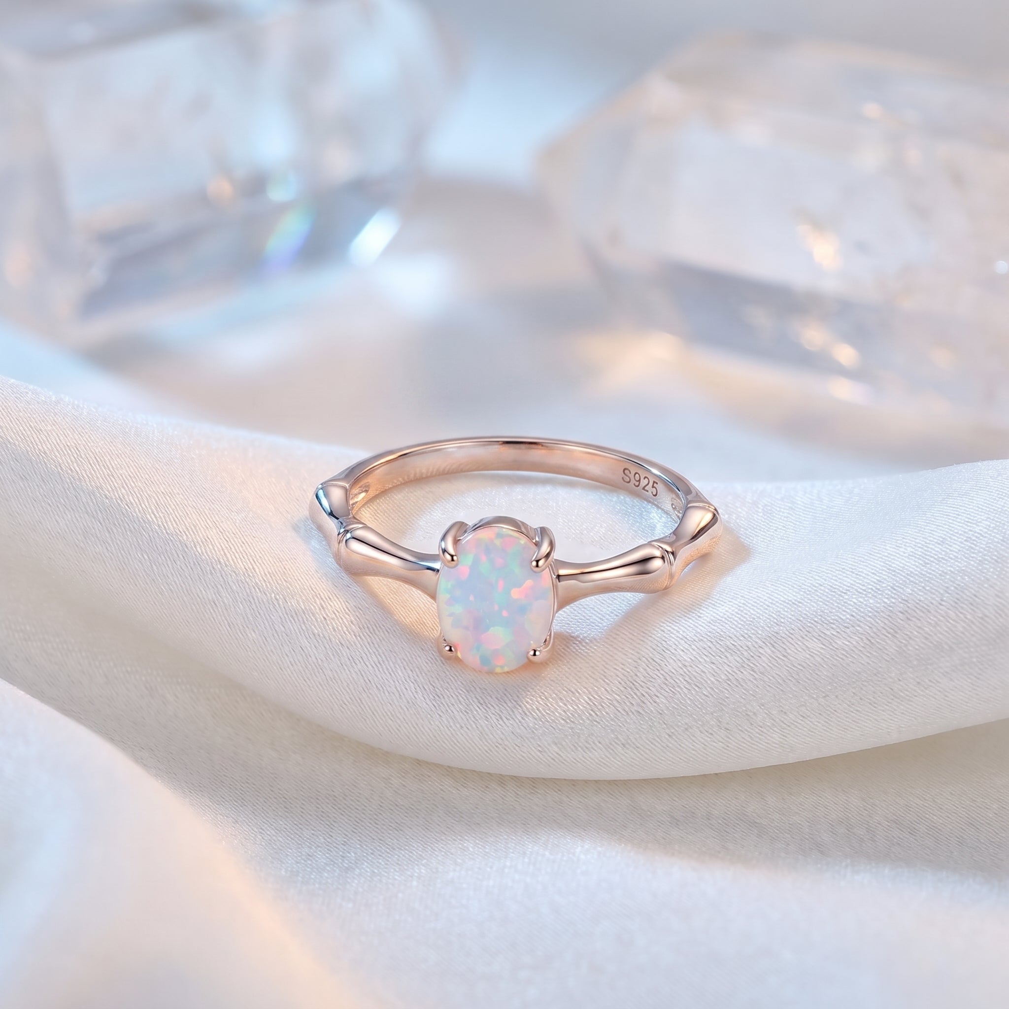The Guinevere oval natural opal ring in solid rose gold.