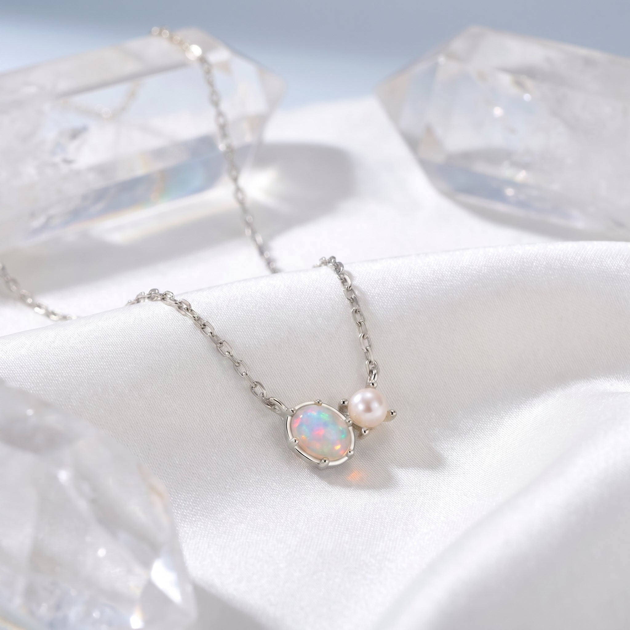 Lumira oval white opal necklace in 14K solid yellow gold.