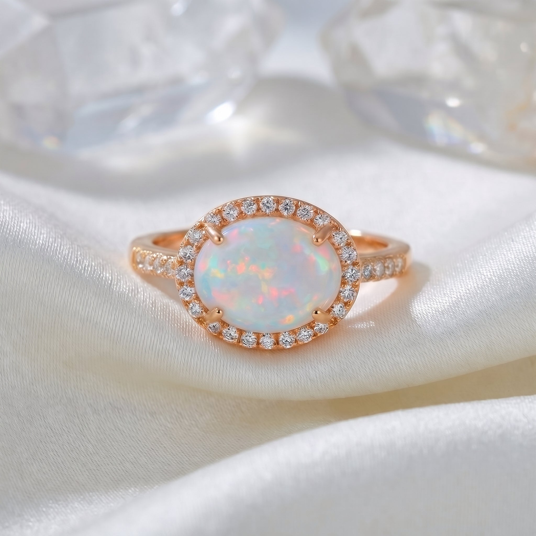 The Magnolia Opal Ring, a solid gold ring with a natural opal.