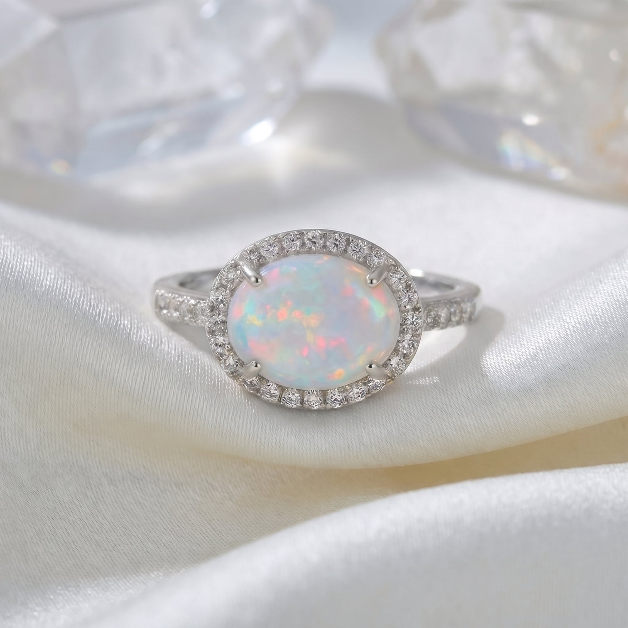 The Magnolia Opal Ring, a solid gold ring with a natural opal.